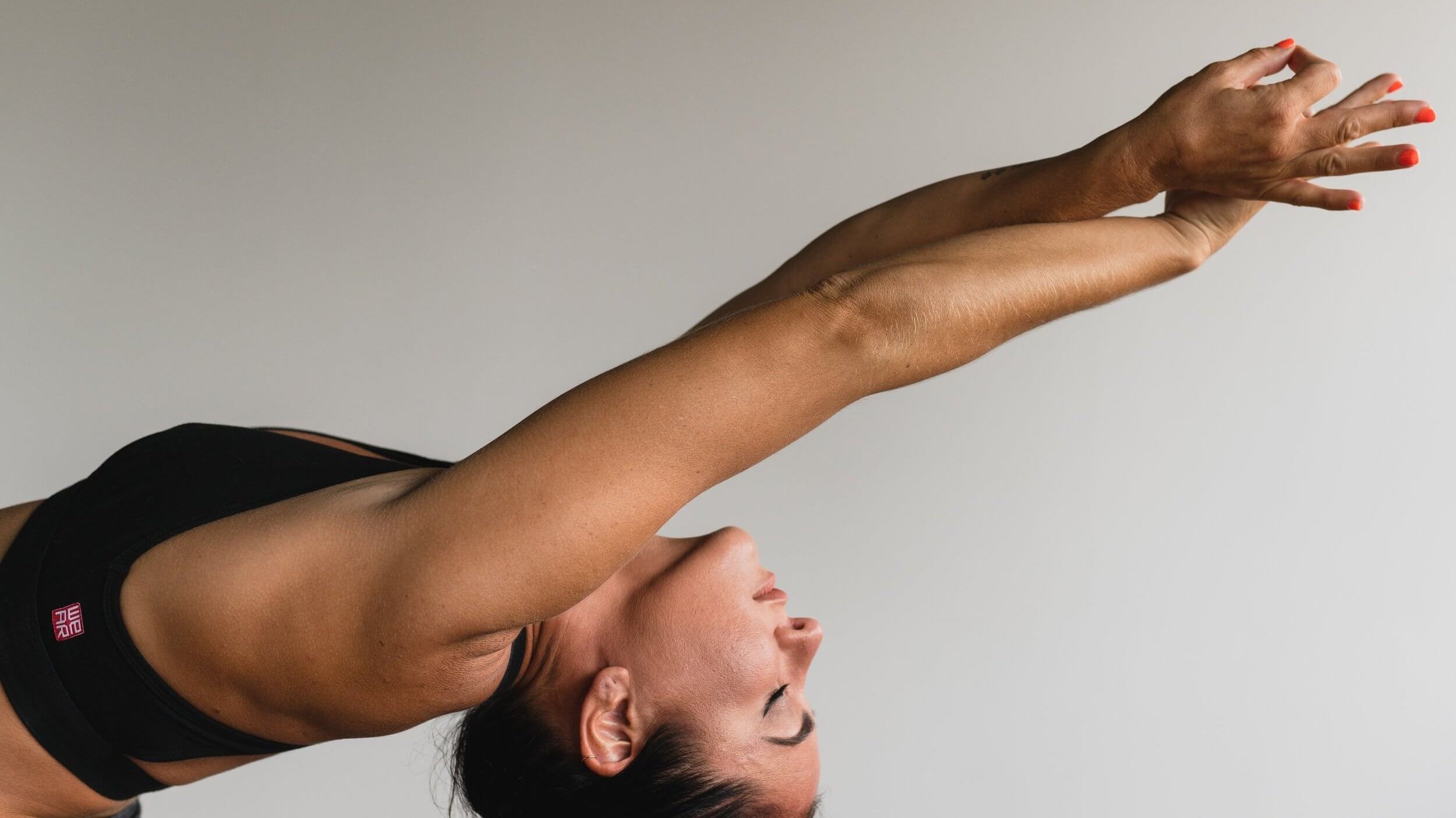 woman stretching, alleviate joint degeneration, reduce pain from joint degeneration with stem cell therapy and PRP